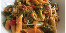 Pasta with vegetables in a creamy peanut sauce