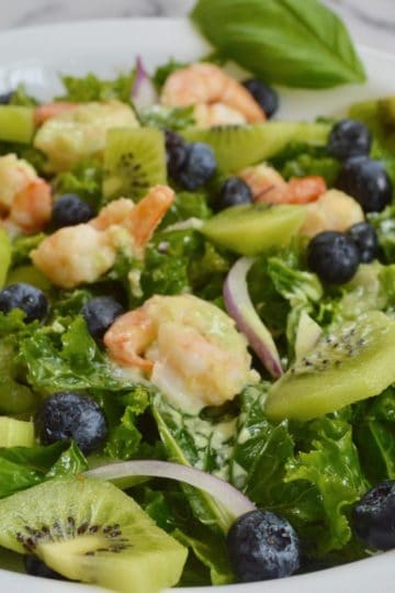 Kale and shrimp salad with a coconut basil dressing